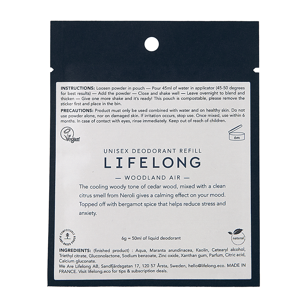 Black pouch with white label. Label describes the scent "Woodland air". The pouch is a refill for refillable sustainable roll-on deodorant from the brand Lifelong.