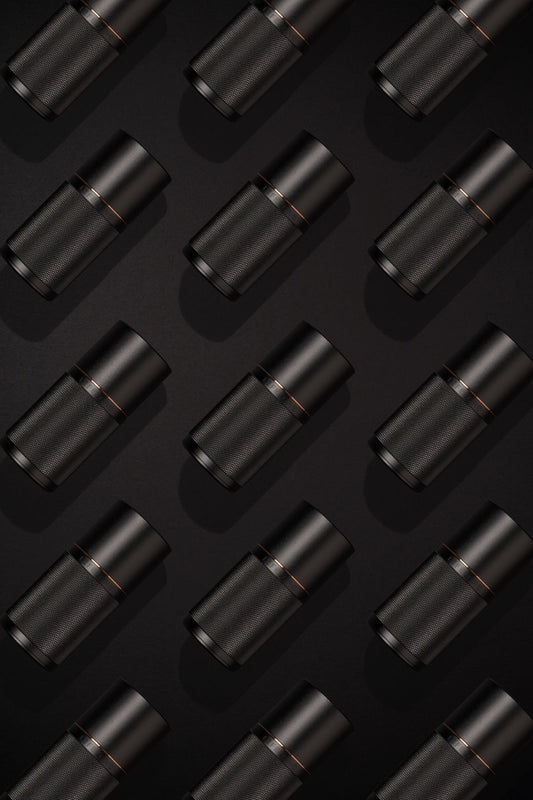 Lifelong Deodorant Stockholm Black refillable natural deodorant applicators in repeating pattern — plastic-free sustainable personal care