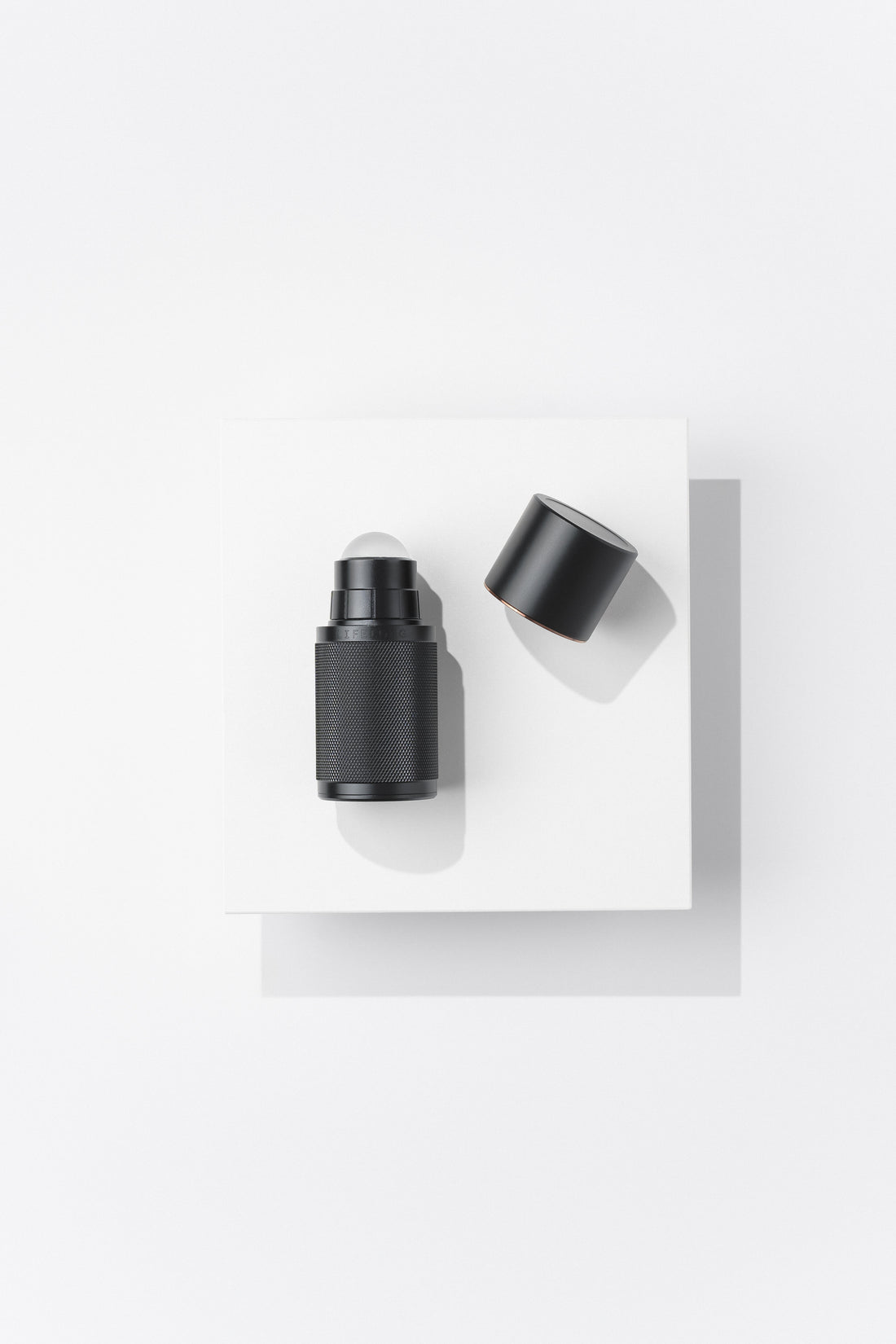 Lifelong Deodorant Stockholm Black refillable aluminium applicator with cap removed — eco-friendly aluminium-free deodorant