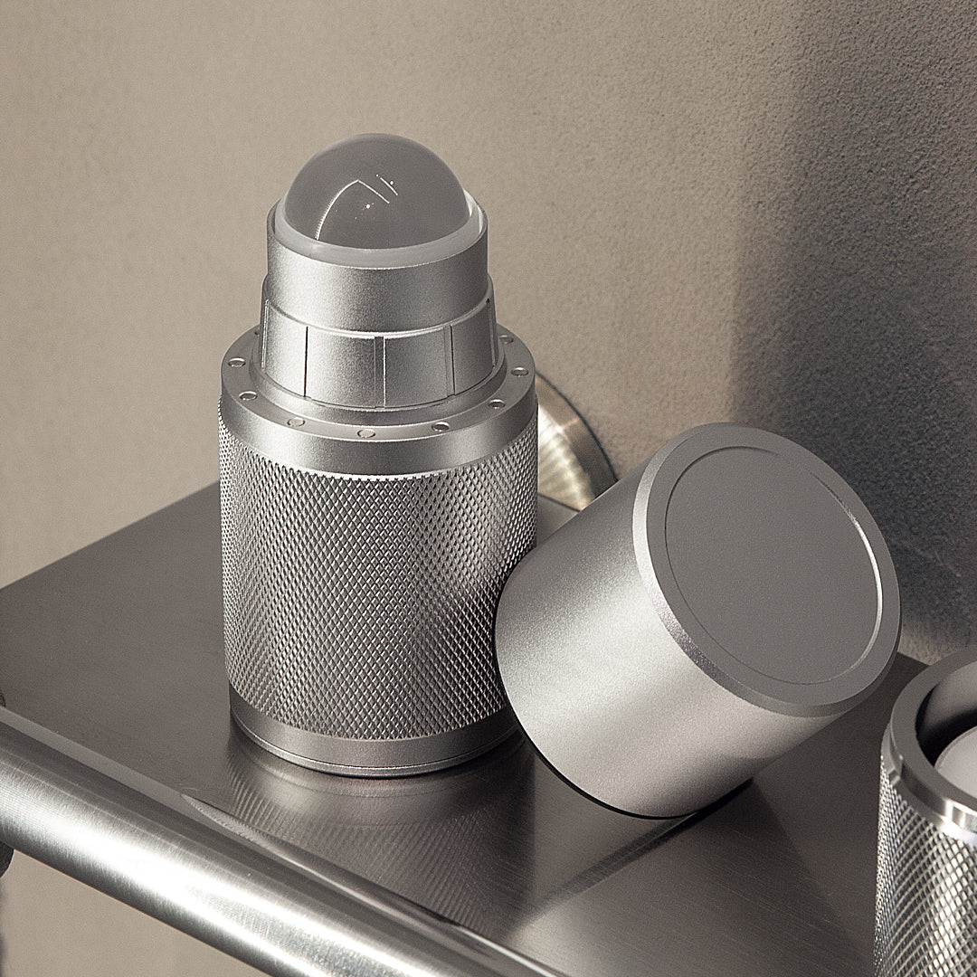 Lifelong refillable aluminium deodorant applicator open with roll-on ball visible — plastic-free natural deodorant