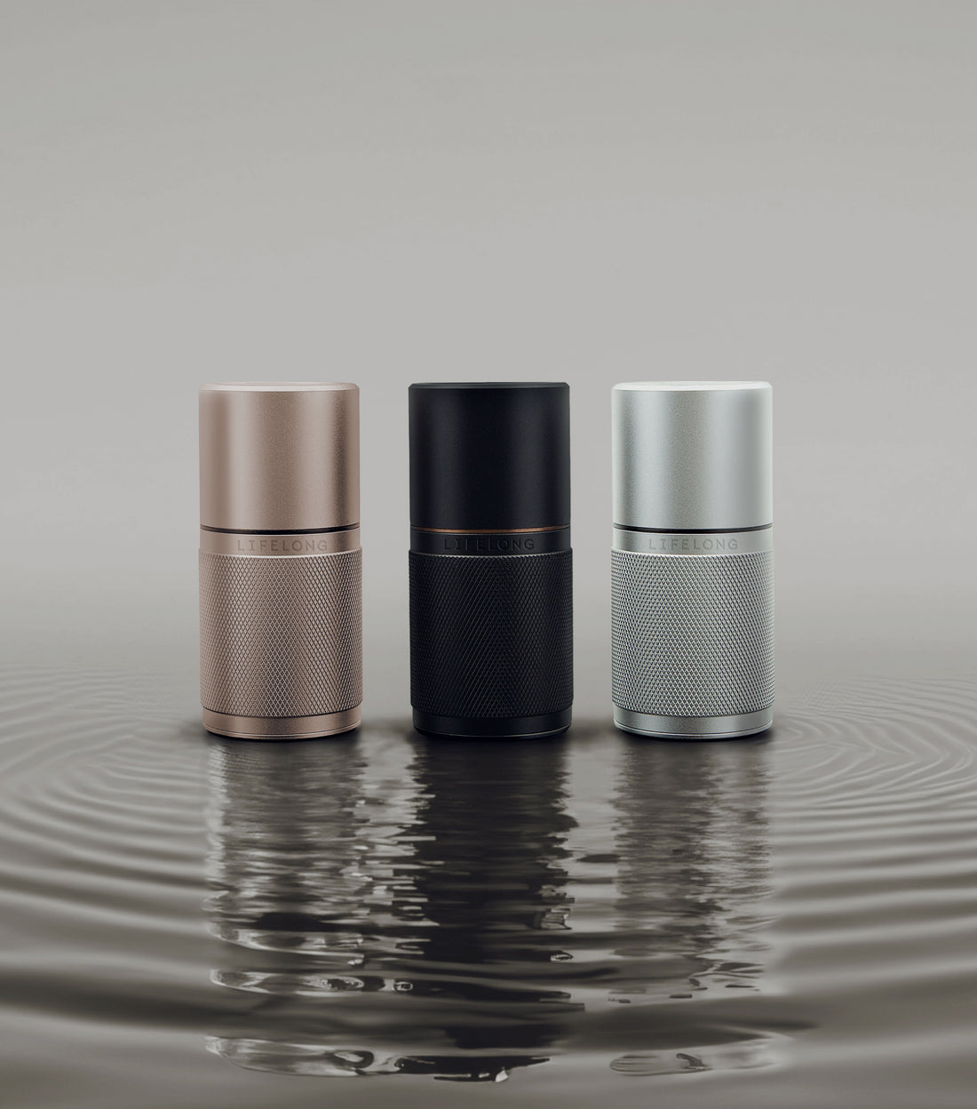 Front‑view of LIFELONG body spray bottles standing upright on white background.