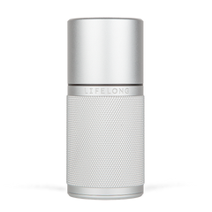 Silver-coloured refillable deodorant with knurled texture, small black details and a logo saying Lifelong in the middle.