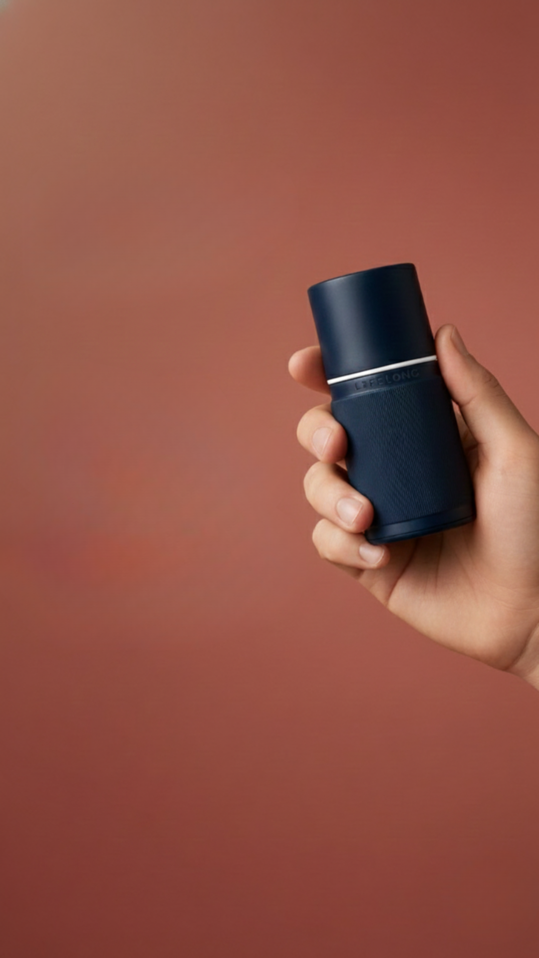 ★ Hand holding Lifelong Vibes Navy Blue refillable deodorant