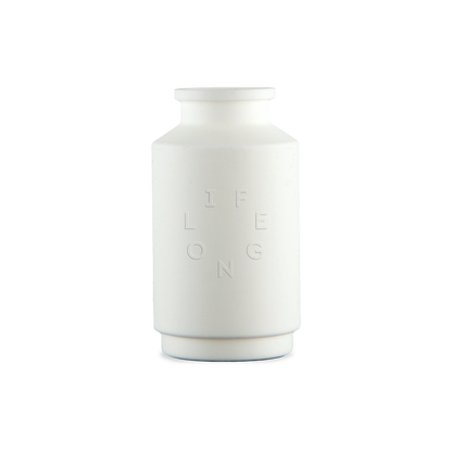 White silicone sleeve for the Lifelong refillable deodorant, debossed Lifelong logo